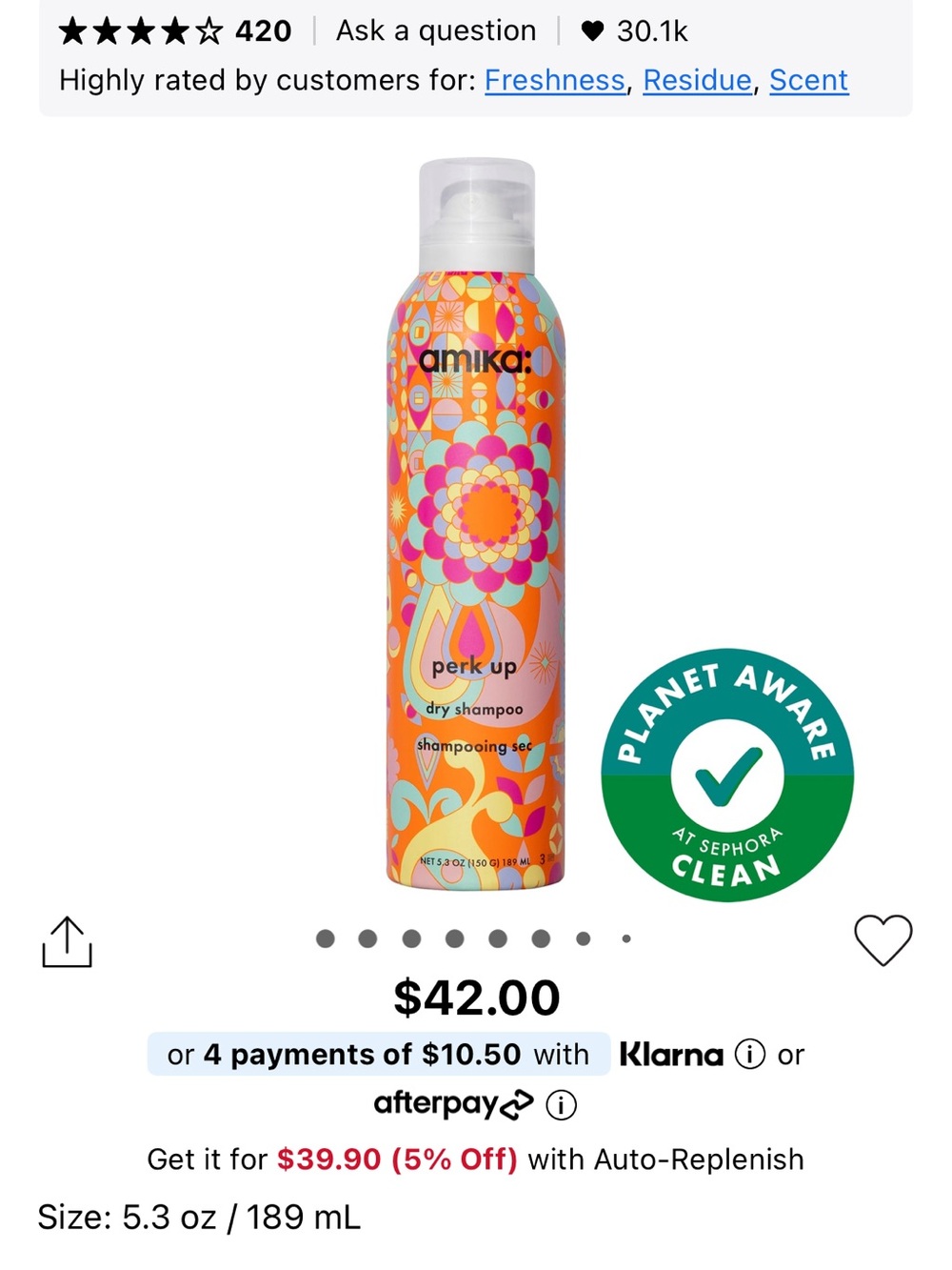 amika orange floral dry shampoo can with pink and yellow accents